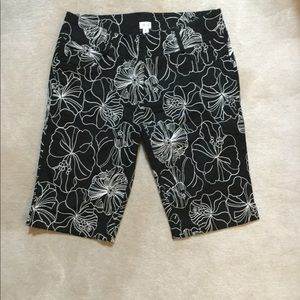 Black and white Bermuda shorts.